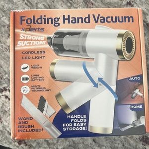 NWT Folding Hand Vacuum